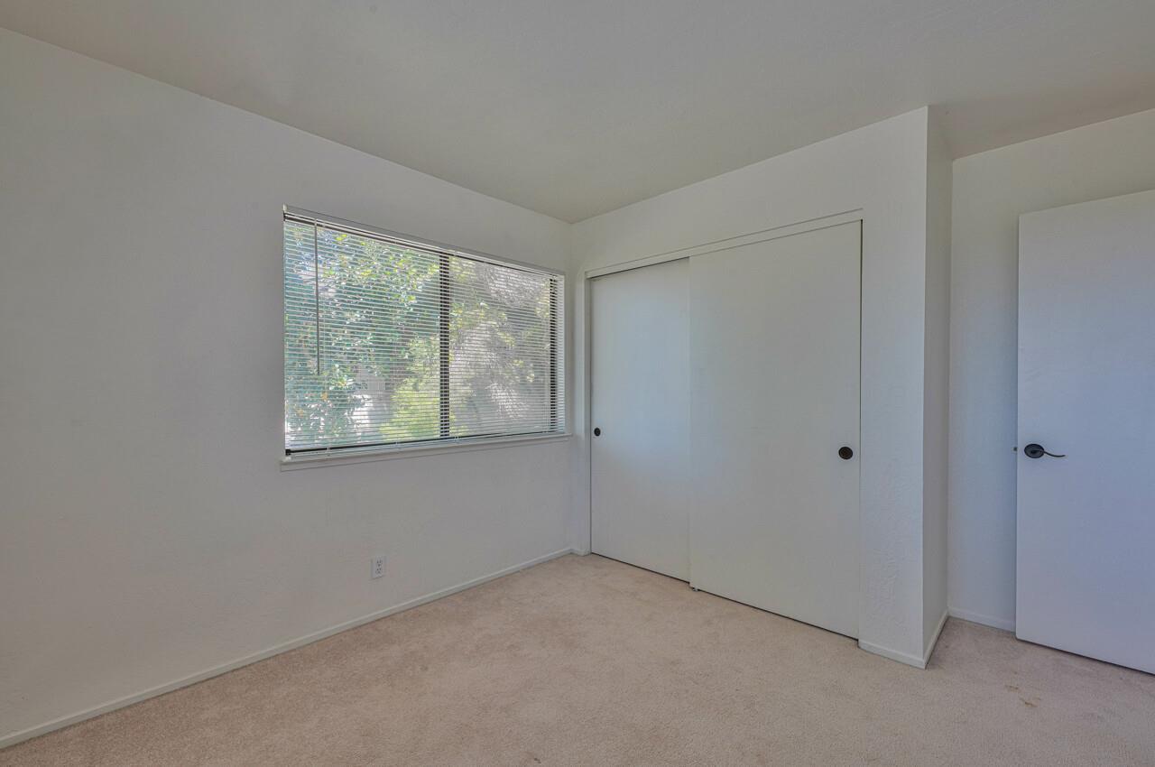 225 Silver Leaf Drive, Unit C Watsonville, CA 95076 - Photo 21 of 24 a view of an empty room with a window