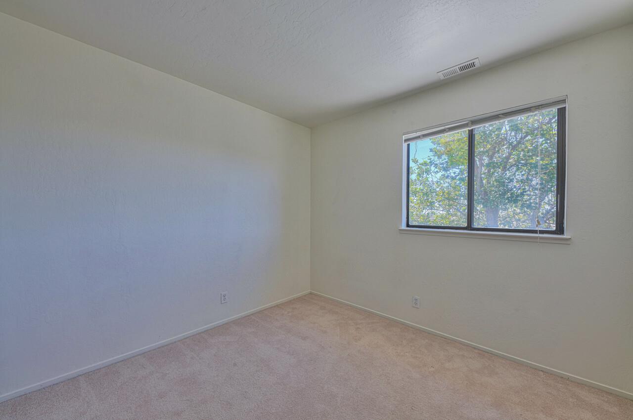 225 Silver Leaf Drive, Unit C Watsonville, CA 95076 - Photo 22 of 24 an empty room with a window