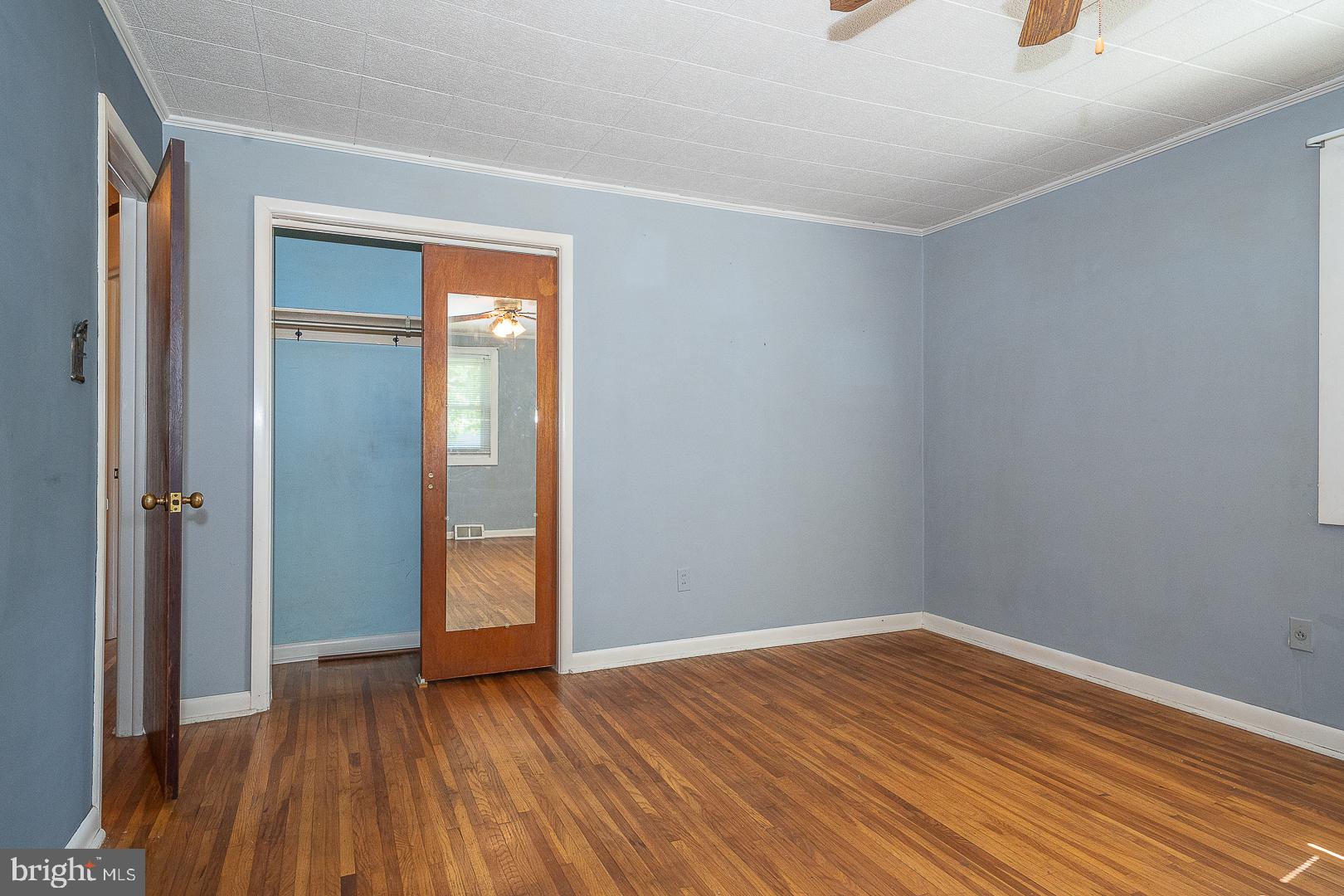 437 Rittenhouse Circle Havertown, PA 19083 - Photo 22 of 55 Serene blue room with wooden floors.