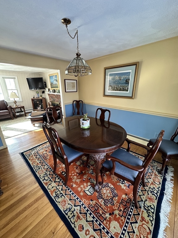 12 Wellington Ln Avenue Lexington, MA 02421 - Photo 8 of 15 a view of a dining room with furniture