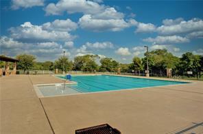 5713 Kennedy Street Austin, TX 78747 - Photo 25 of 30 View of pool with patio surround