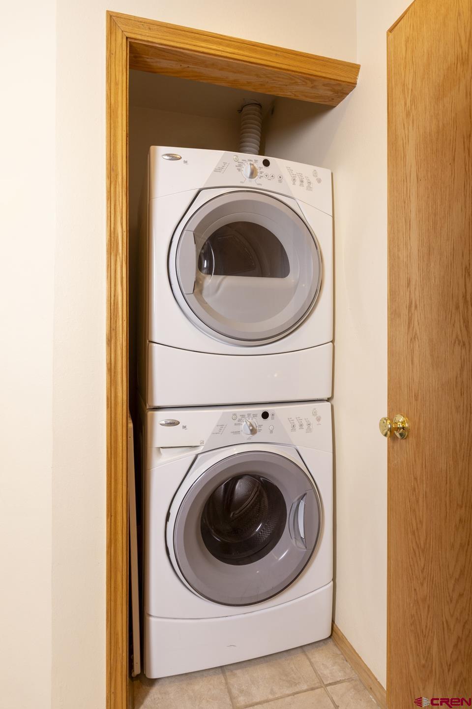 71 Needles Way, Unit 541 Durango, CO 81301 - Photo 17 of 32 a utility room with dryer and washer