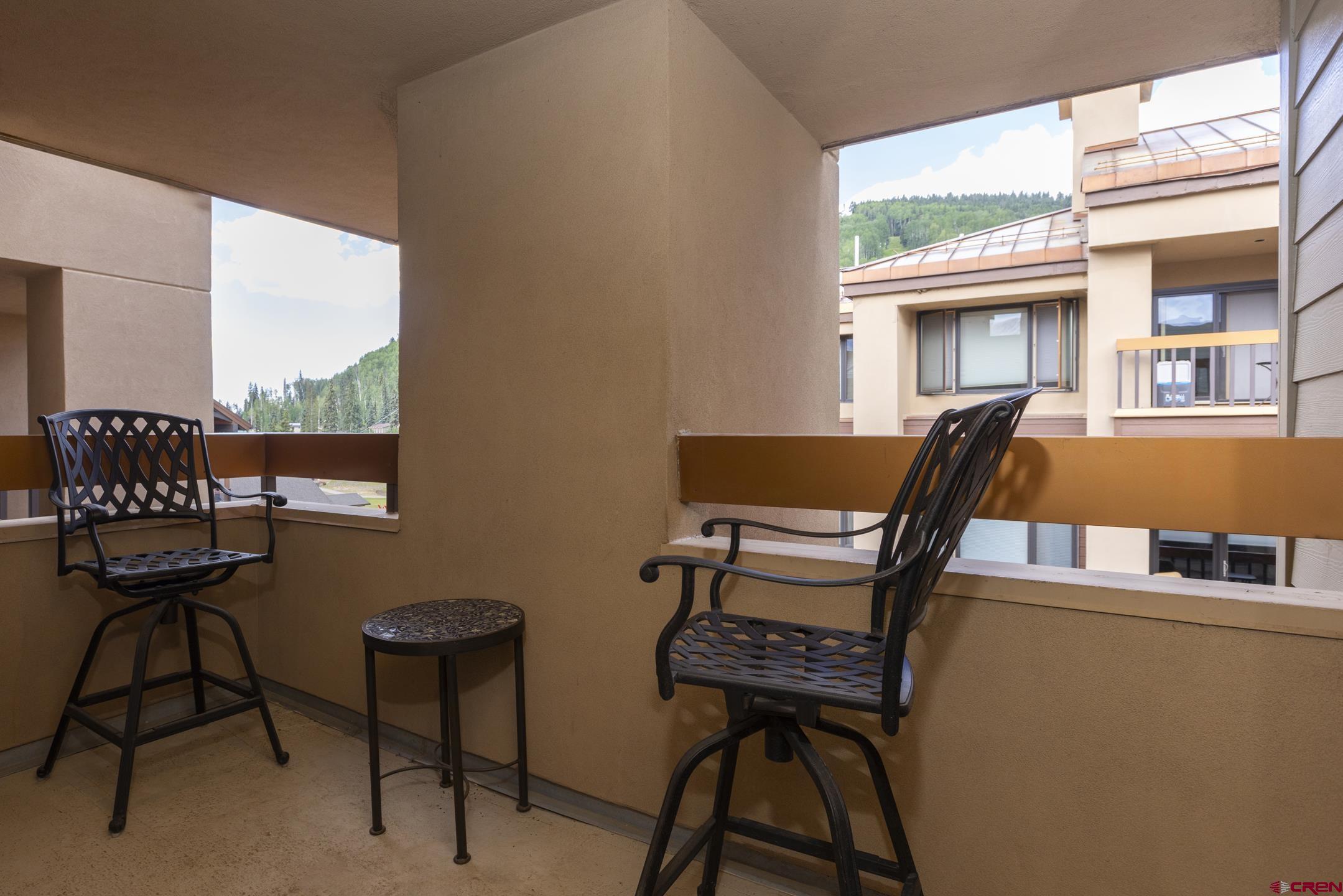 71 Needles Way, Unit 541 Durango, CO 81301 - Photo 19 of 32 a view of a workspace with furniture and a window