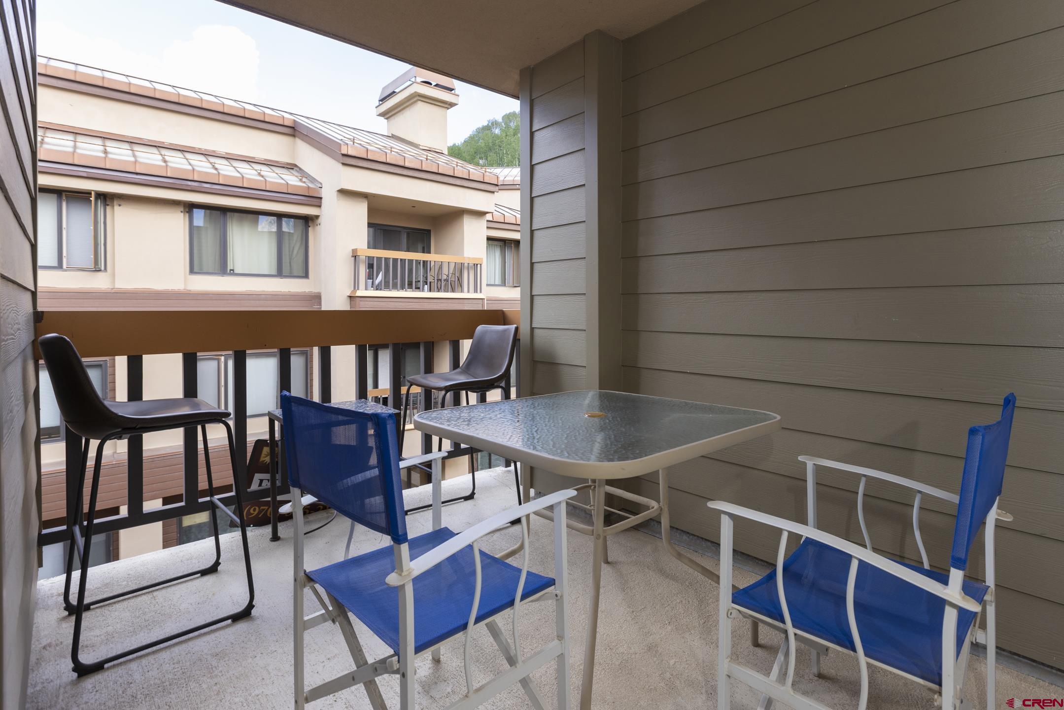 71 Needles Way, Unit 541 Durango, CO 81301 - Photo 20 of 32 a view of a chairs and table in the balcony