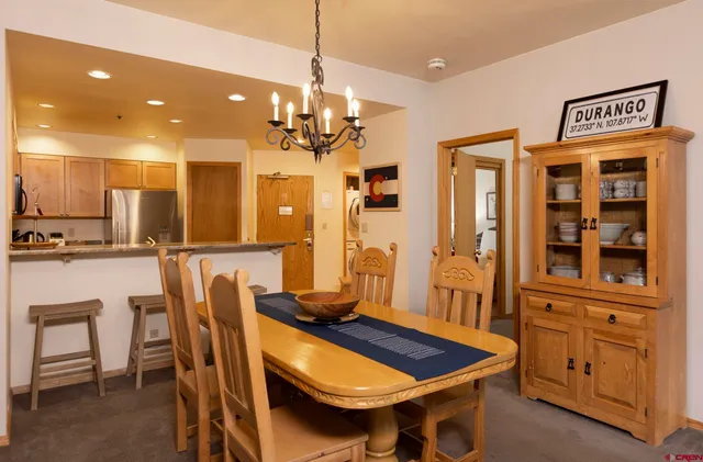 a view of a dining room with furniture