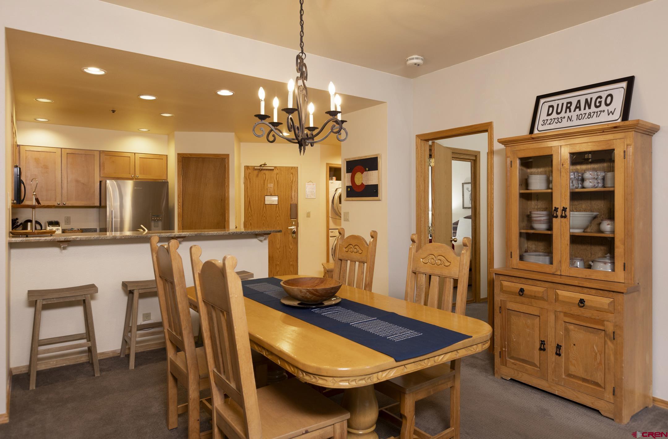 71 Needles Way, Unit 541 Durango, CO 81301 - Photo 2 of 32 a view of a dining room with furniture