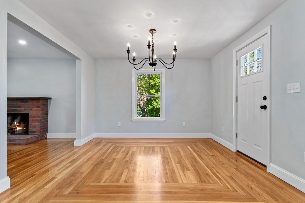 32 Herbert Avenue Saugus, MA 01906 - Photo 9 of 35 a view of empty room with window and wooden floor