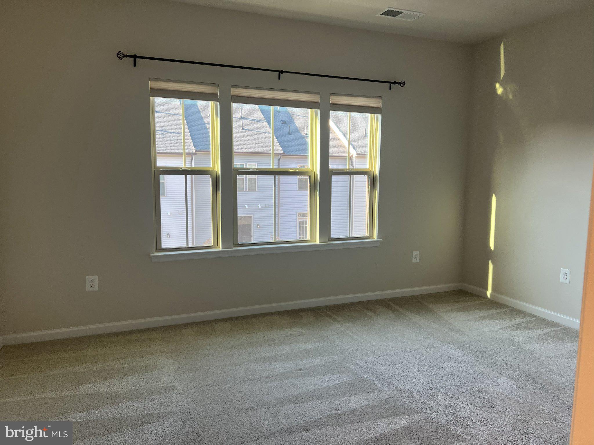 8058 Big Roundtop Road Fort George G Meade, MD 20755 - Photo 14 of 24 an empty room with a window