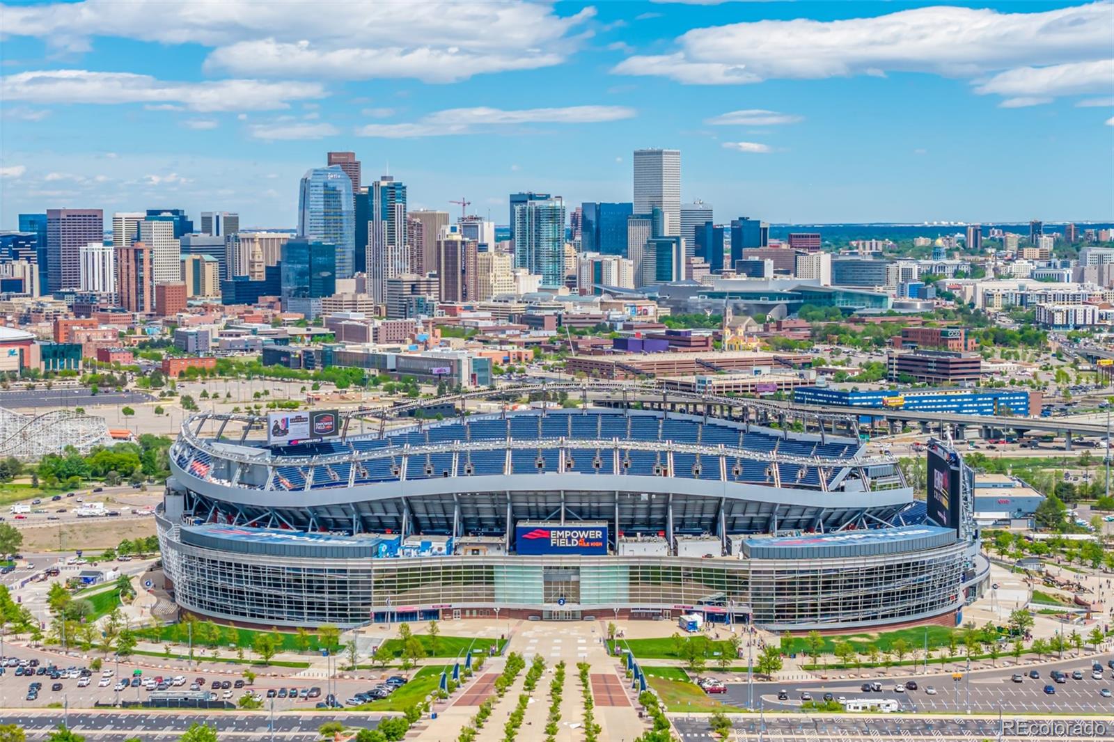 1800 Grove Street Denver, CO 80204 - Photo 12 of 35 a large building with a city view