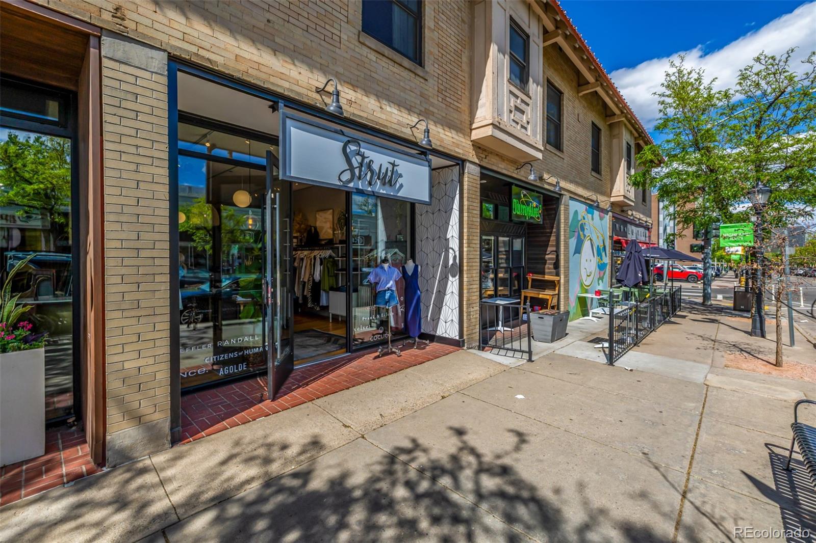 1800 Grove Street Denver, CO 80204 - Photo 21 of 35 a view of street with shops