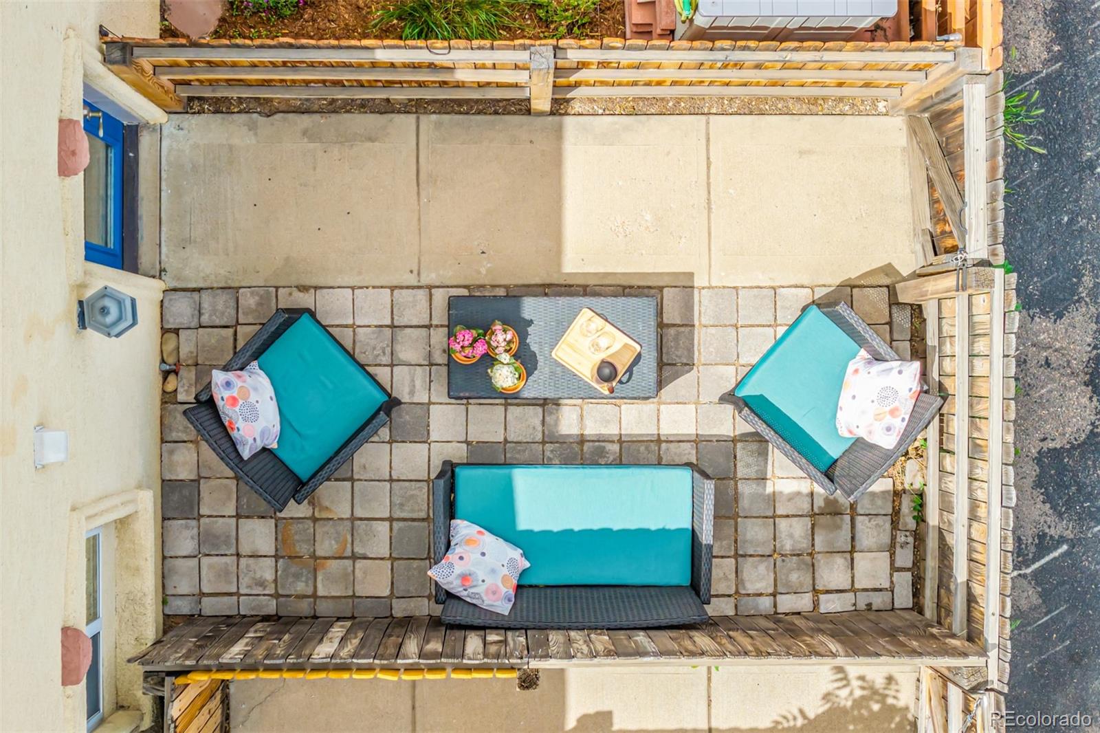 1800 Grove Street Denver, CO 80204 - Photo 25 of 35 a room with a wooden floor and a wall painting