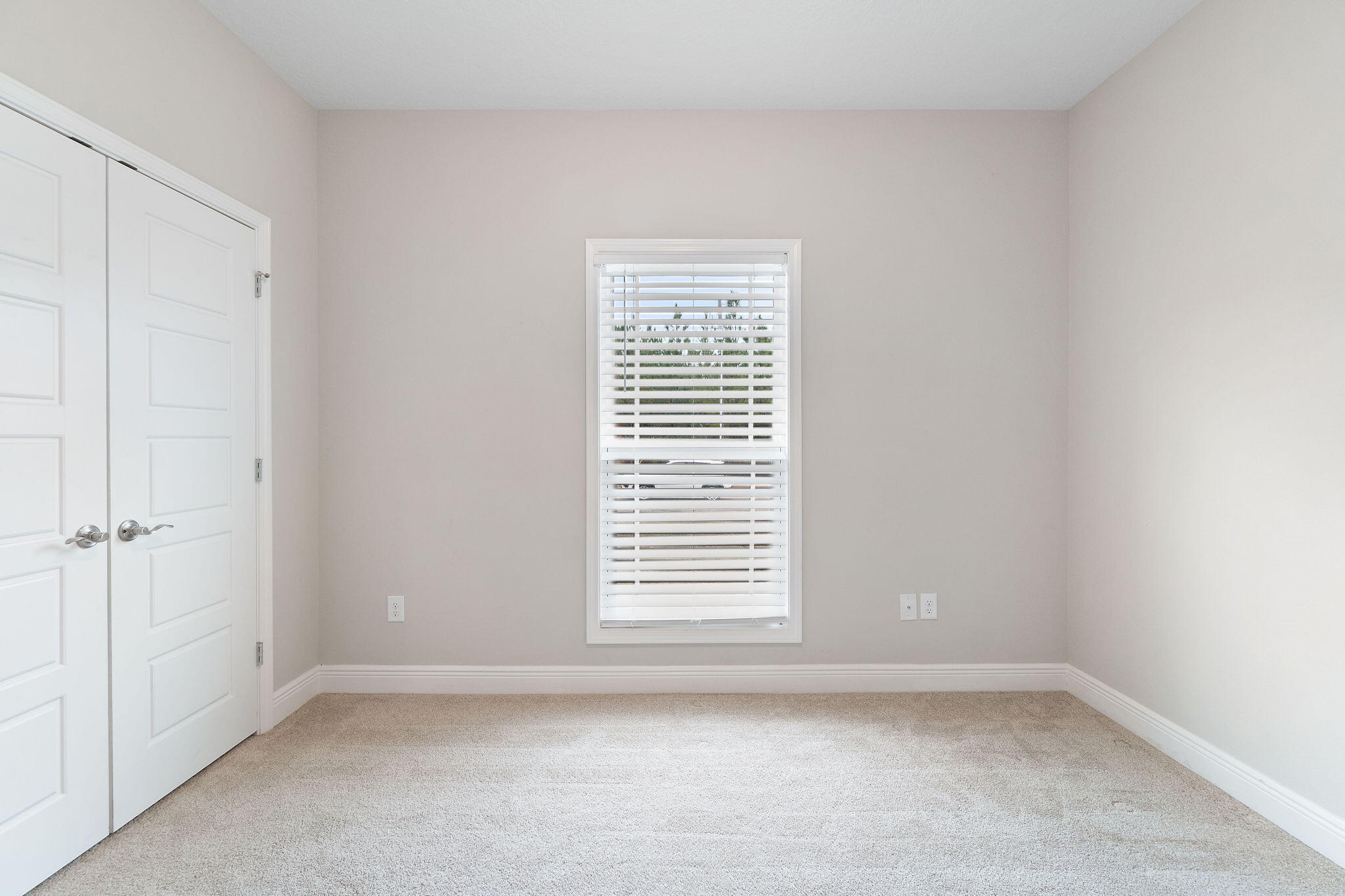 7745 Tidwell Road Pace, FL 32571 - Photo 21 of 57 a view of an empty room with a window