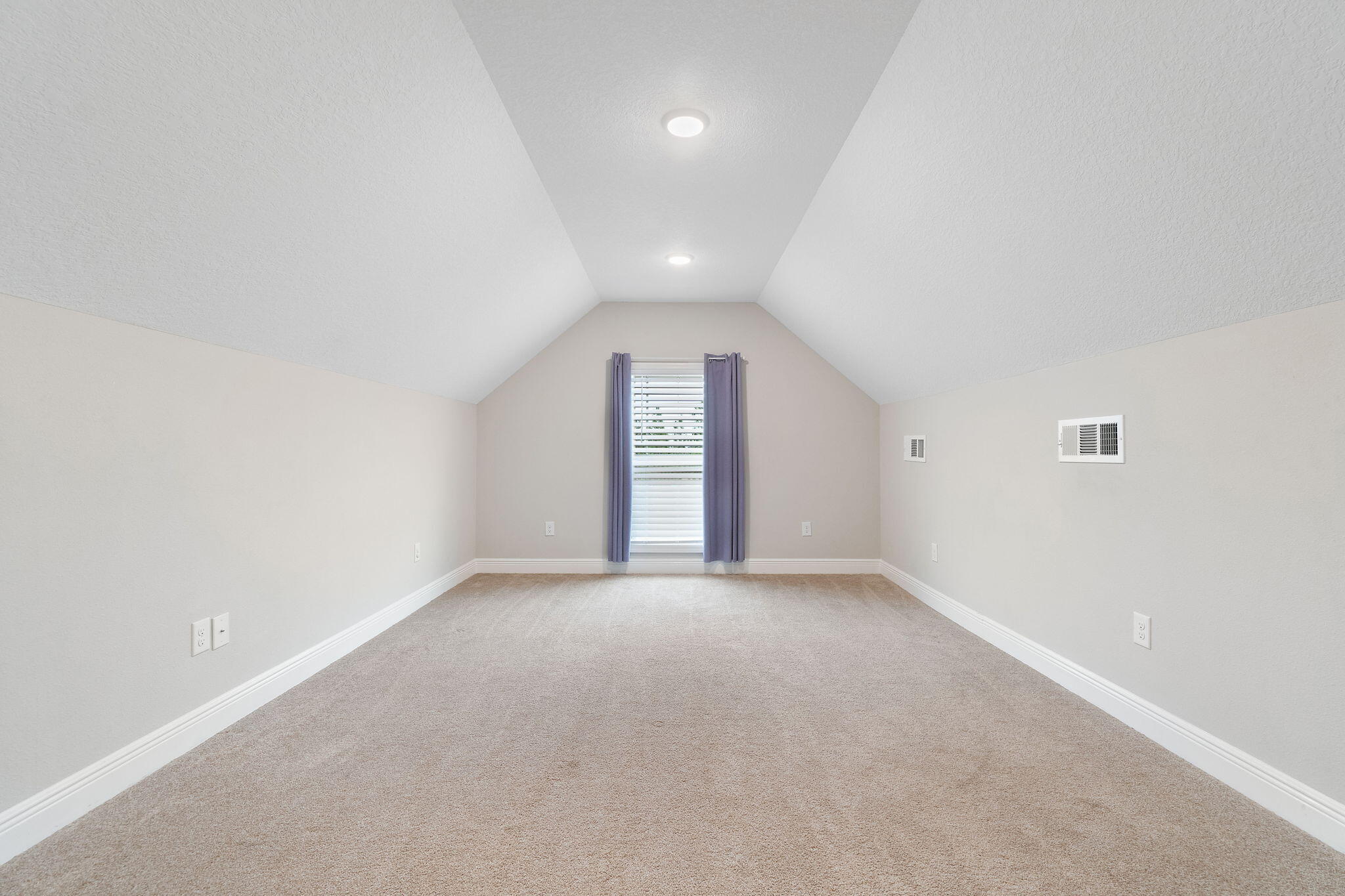 7745 Tidwell Road Pace, FL 32571 - Photo 33 of 57 an empty room with windows and cabinet