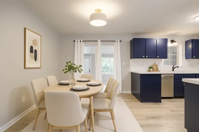 a view of livingroom with a ceiling fan and window