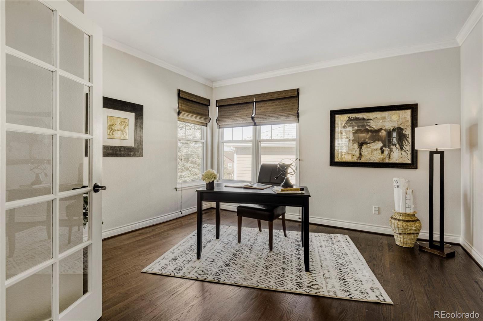 8573 South Mallard Court Highlands Ranch, CO 80126 - Photo 15 of 50 a view of a livingroom with furniture and window