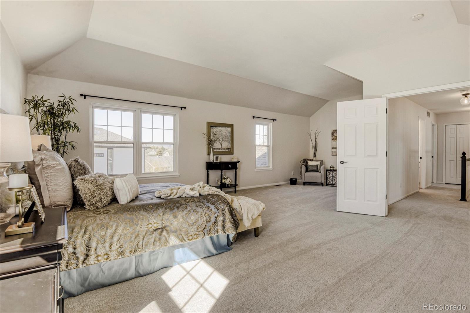 8573 South Mallard Court Highlands Ranch, CO 80126 - Photo 19 of 50 a bedroom with bed and window