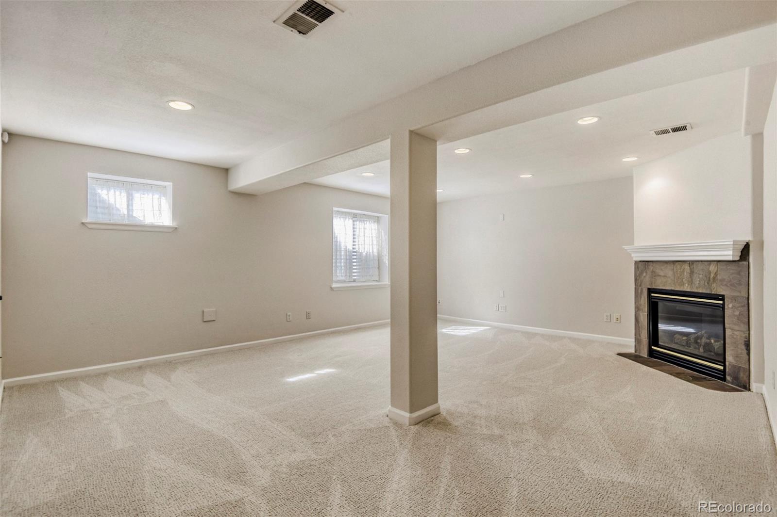 8573 South Mallard Court Highlands Ranch, CO 80126 - Photo 28 of 50 a view of an empty room with a window