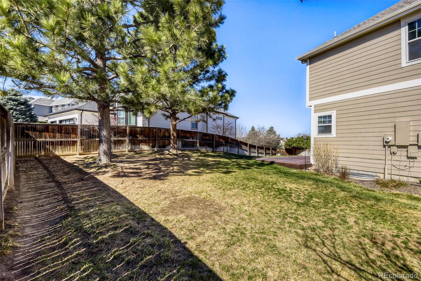 8573 South Mallard Court Highlands Ranch, CO 80126 - Photo 35 of 50 a view of swimming pool with outdoor seating and yard
