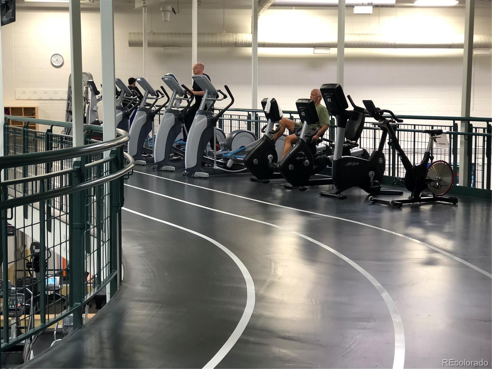 8573 South Mallard Court Highlands Ranch, CO 80126 - Photo 42 of 50 a view of a room with gym equipment