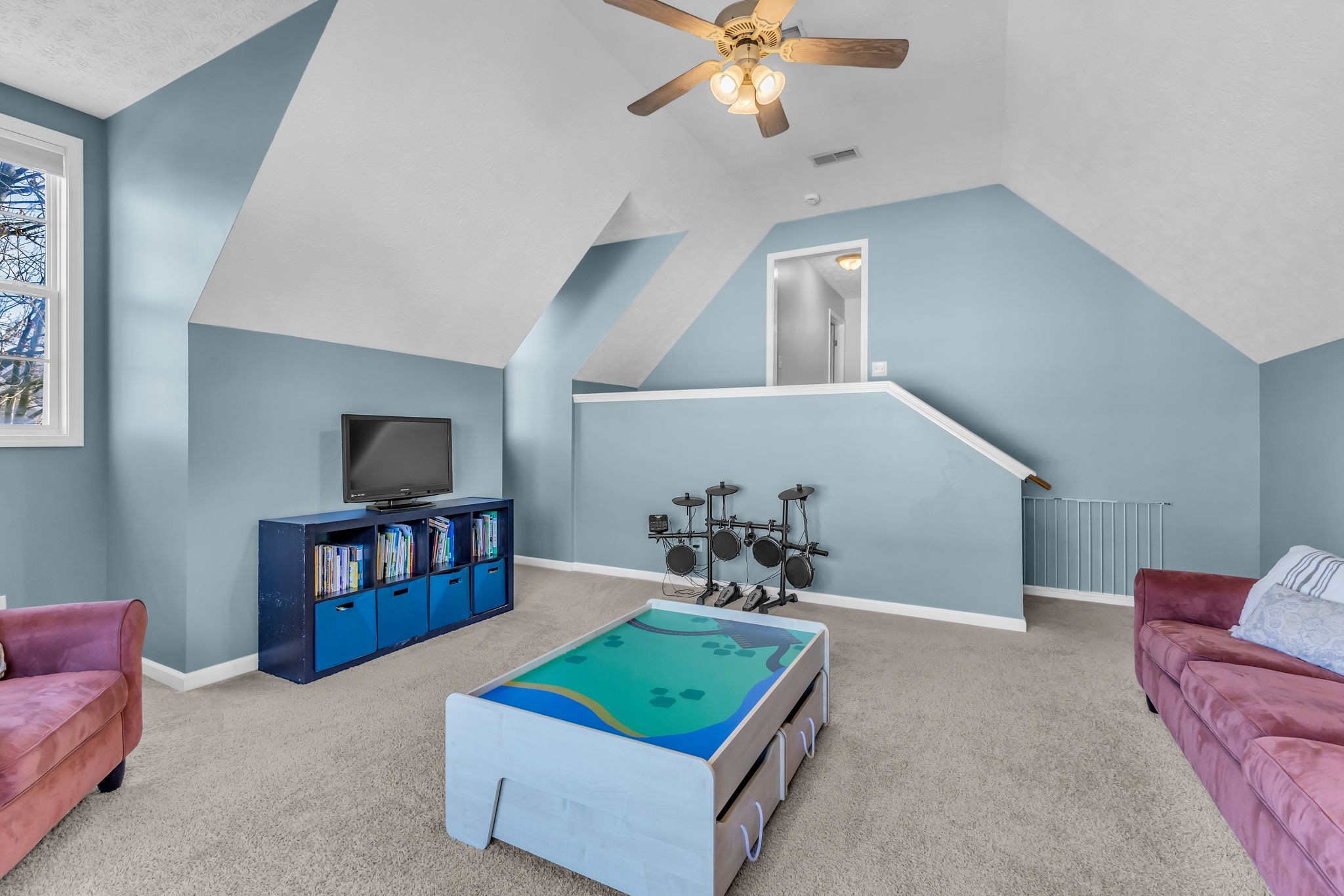 2005 Trenton Drive Spring Hill, TN 37174 - Photo 24 of 35 a living room with furniture and a flat screen tv