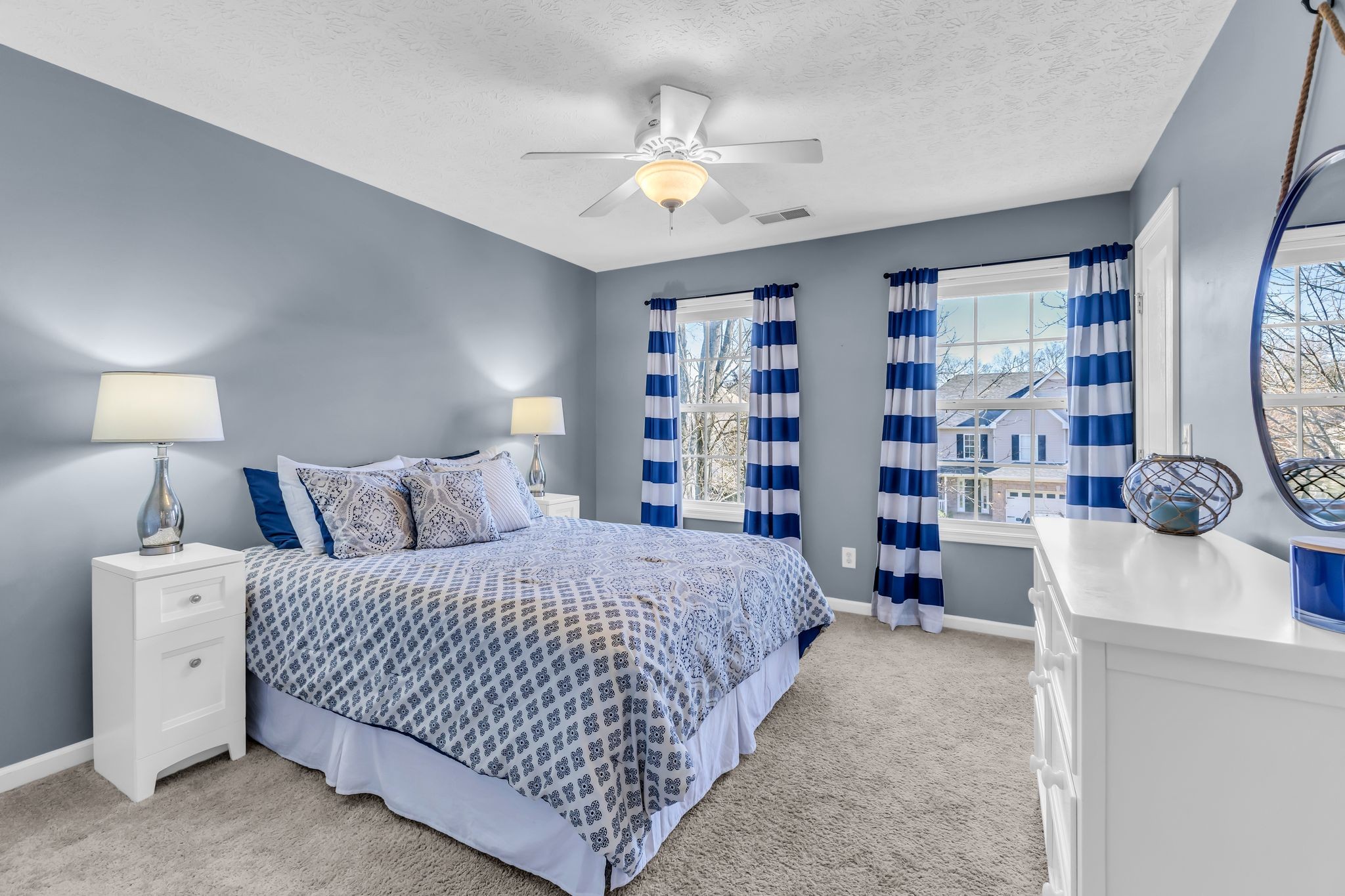 2005 Trenton Drive Spring Hill, TN 37174 - Photo 26 of 35 a bedroom with a bed and a book shelf