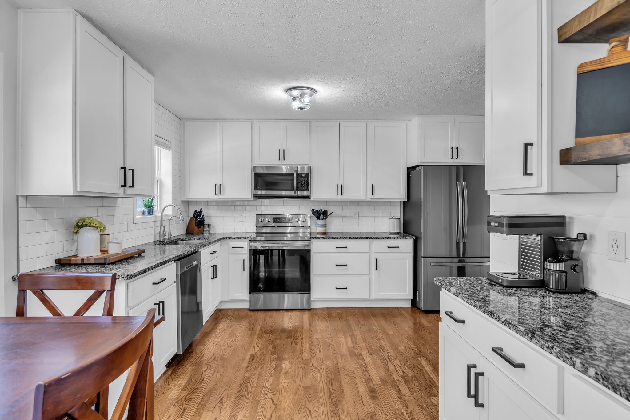 2005 Trenton Drive Spring Hill, TN 37174 - Photo 8 of 35 a kitchen with a sink stove and refrigerator