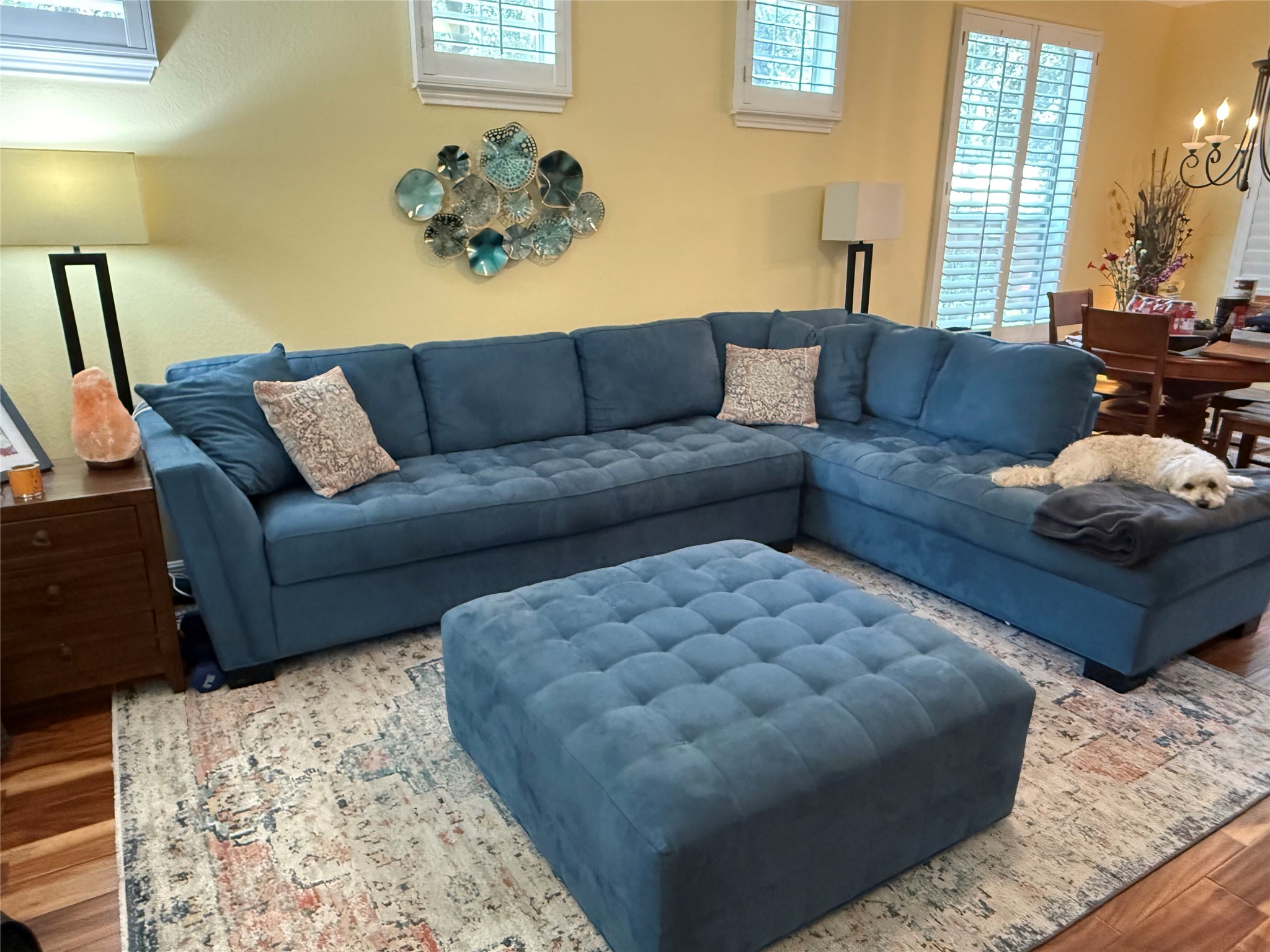 11000 Anderson Mill Road, Unit 93 Austin, TX 78750 - Photo 3 of 27 Relax in this comfortable living space with warm lighting and a cozy sectional.