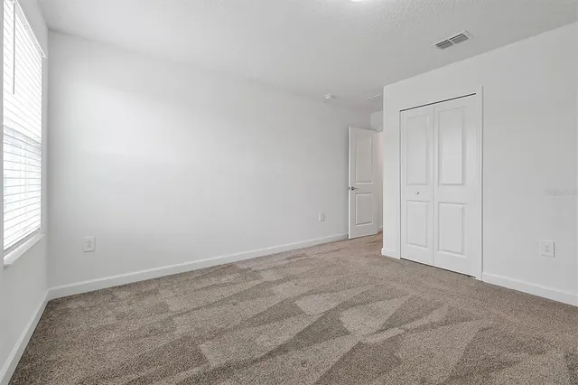 an empty room with an entryway