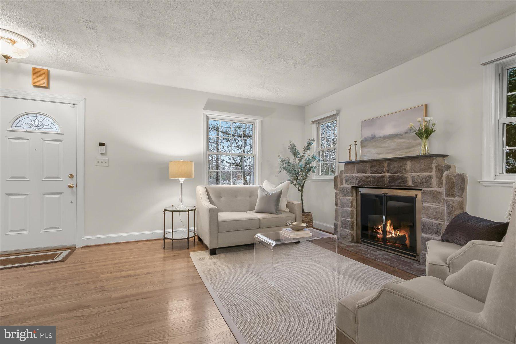 6011 Walhonding Road Bethesda, MD 20816 - Photo 20 of 51 Living room with charming fireplace