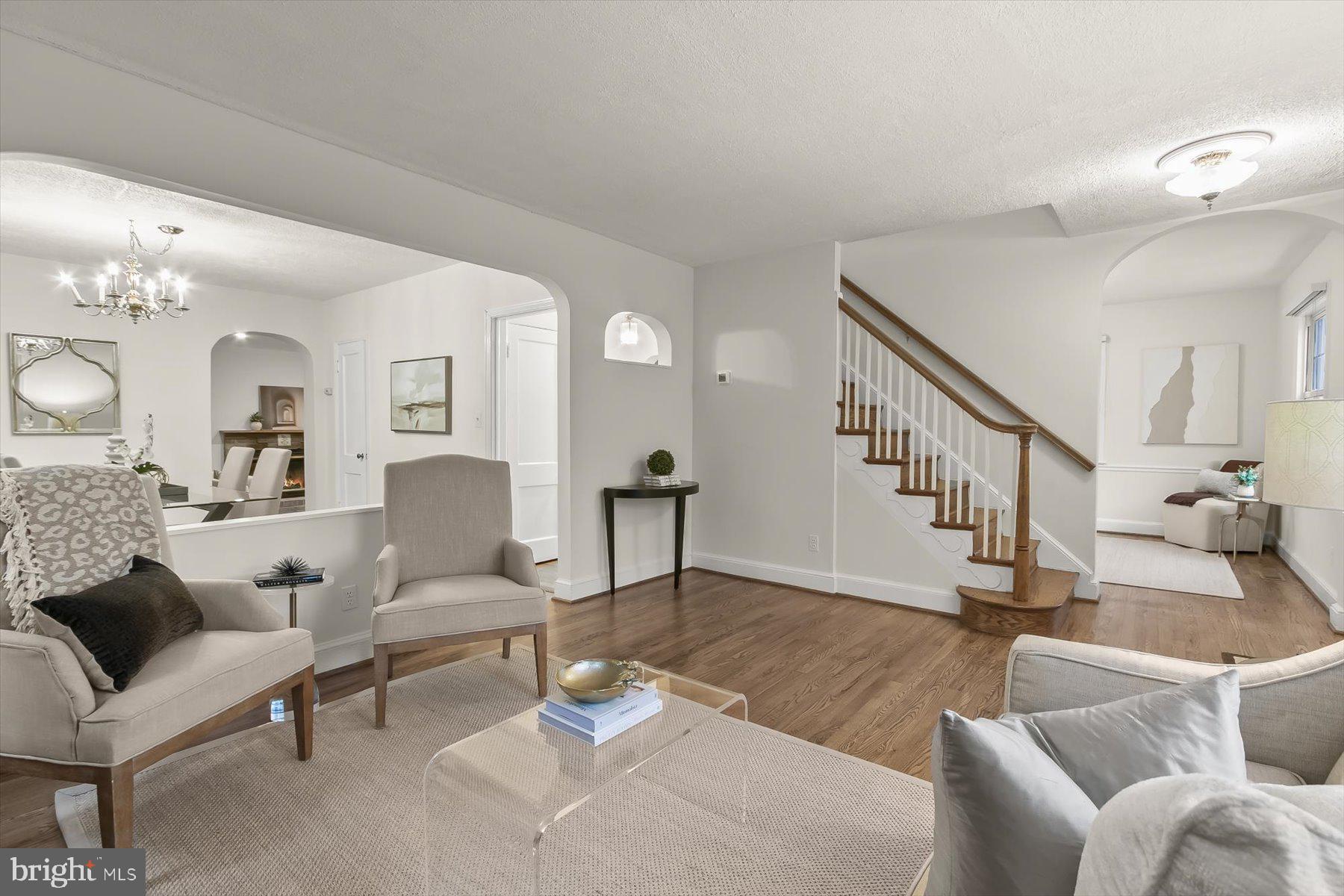 6011 Walhonding Road Bethesda, MD 20816 - Photo 21 of 51 Living room has 1/2 wall separating it from dining