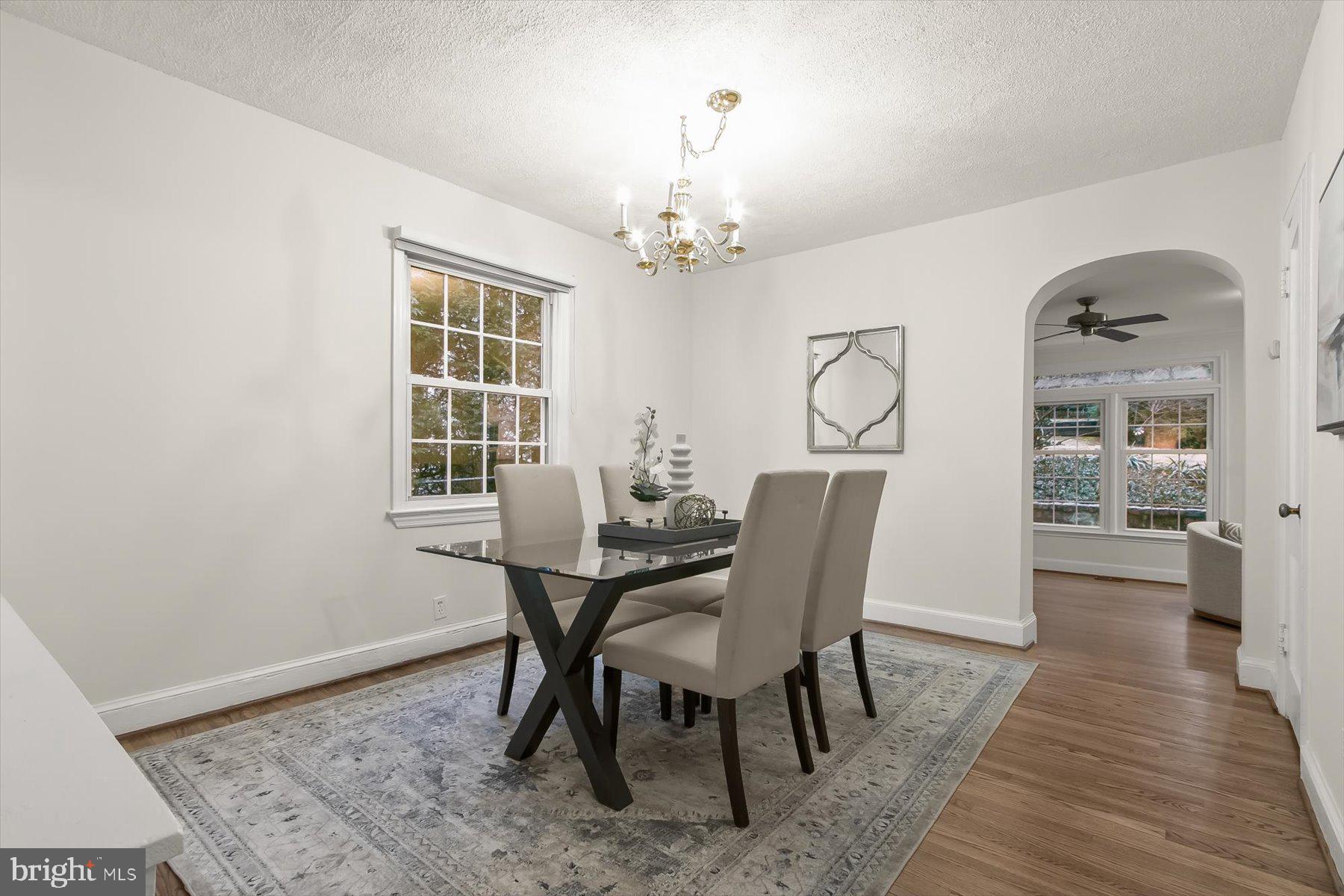 6011 Walhonding Road Bethesda, MD 20816 - Photo 22 of 51 Dining room, step down to Family room