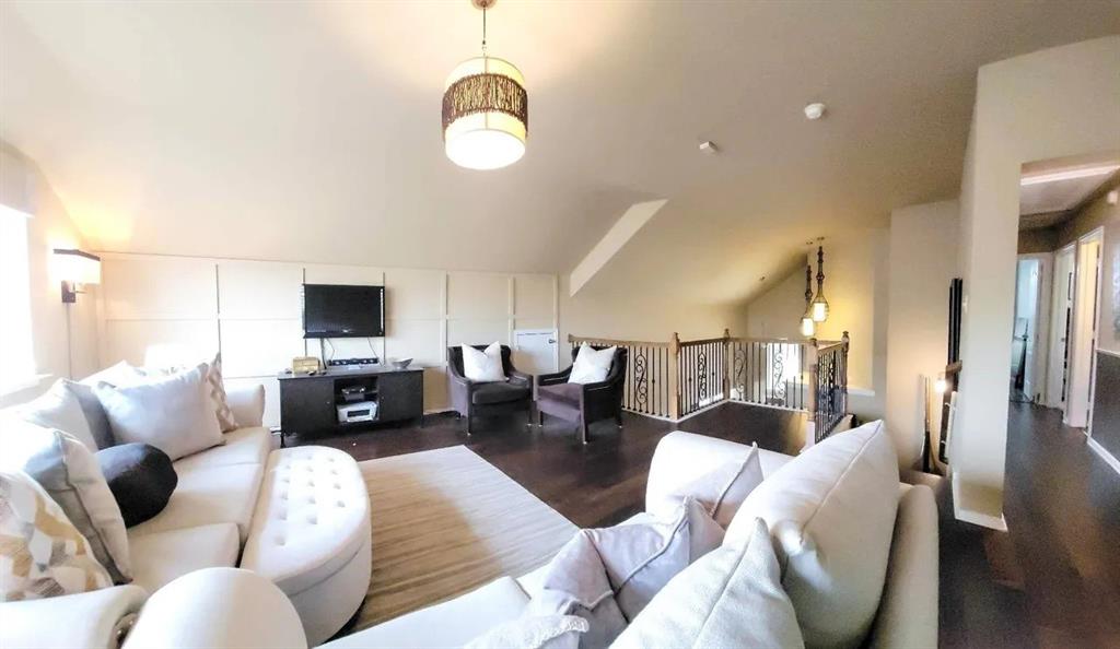 1391 Riverside Oaks Drive Rockwall, TX 75087 - Photo 15 of 32 a living room with furniture and a flat screen tv