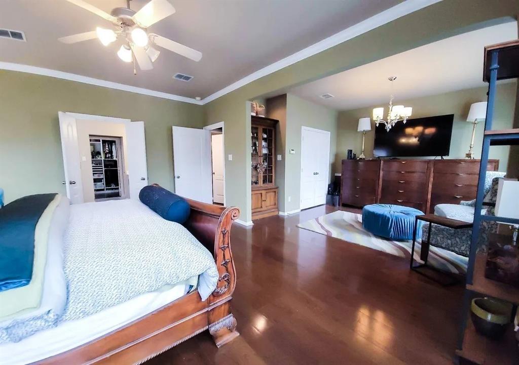 1391 Riverside Oaks Drive Rockwall, TX 75087 - Photo 18 of 32 a bed room with bed and window