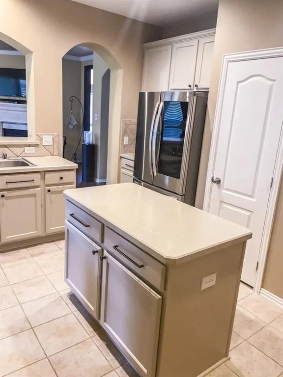 1391 Riverside Oaks Drive Rockwall, TX 75087 - Photo 10 of 32 a kitchen with stainless steel appliances a refrigerator and a stove
