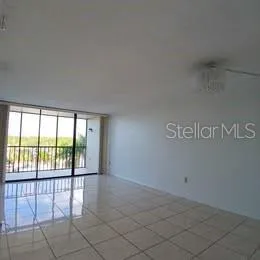 an empty room with sliding door