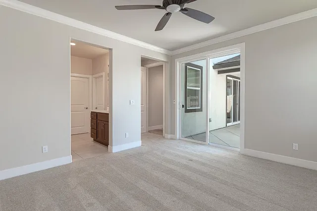 an empty room with a bathroom