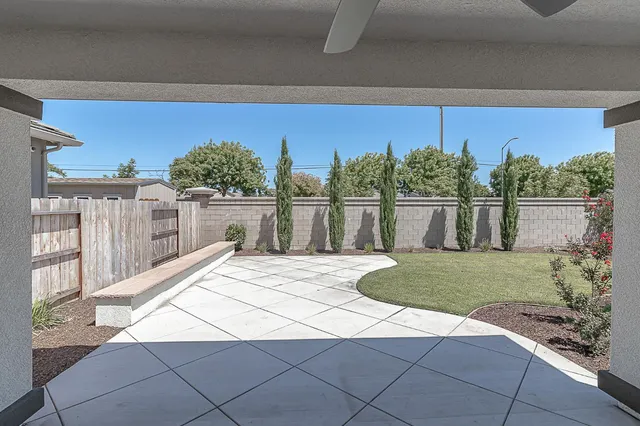 a view of a balcony and next to a yard