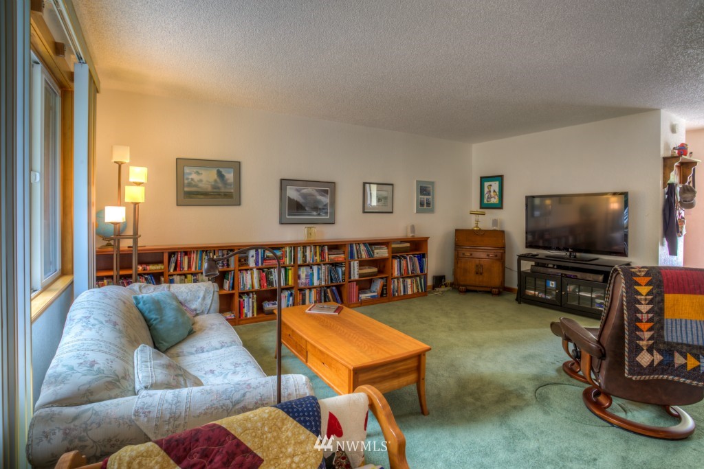 2833 Morris Avenue South Renton, WA 98055 - Photo 3 of 16 a living room with furniture and a flat screen tv