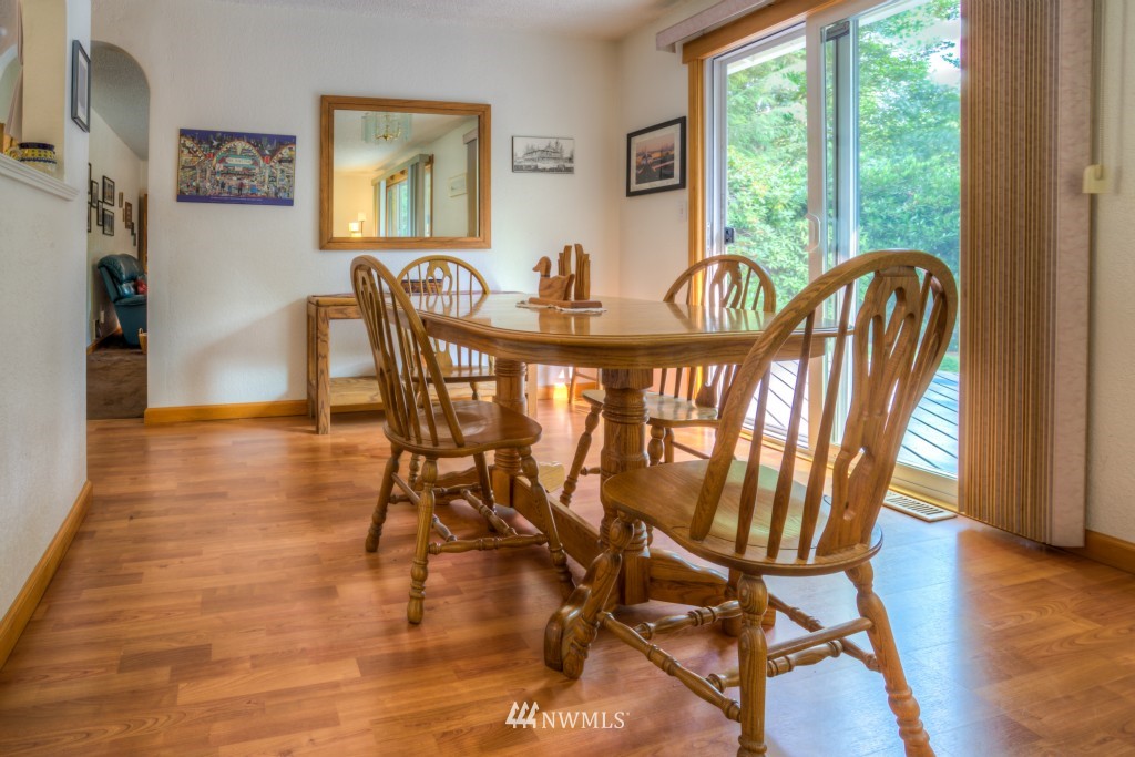 2833 Morris Avenue South Renton, WA 98055 - Photo 5 of 16 a dining room with furniture window and wooden floor