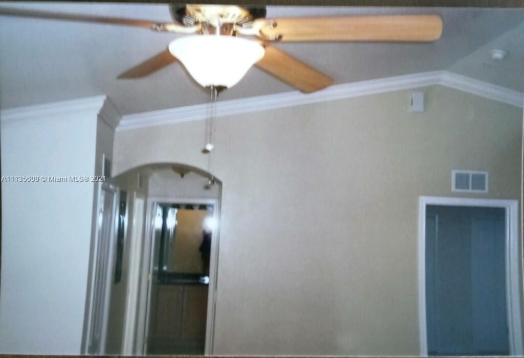 3973-3975 Sunset Road Lehigh Acres, FL 33971 - Photo 6 of 14 a close view of light fixtures and entryway