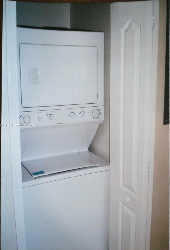 3973-3975 Sunset Road Lehigh Acres, FL 33971 - Photo 9 of 14 a close up view of washer and dryer
