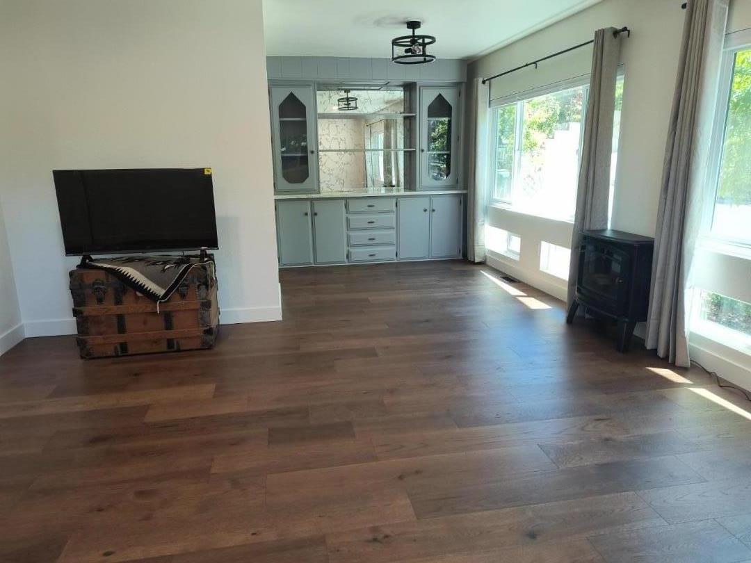 552 Bean Creek Road, Unit 126 Scotts Valley, CA 95066 - Photo 9 of 34 wooden floor in an empty room with window