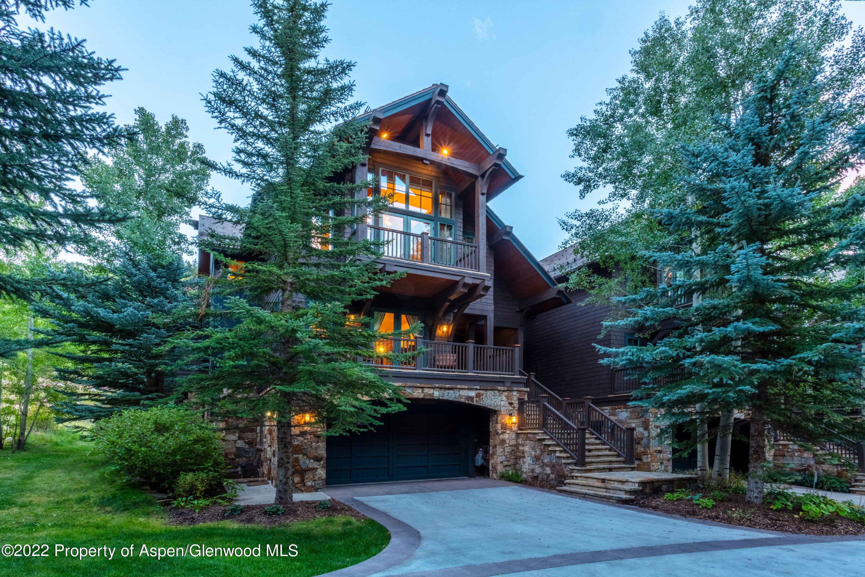 111 Stein Way Aspen, CO 81611 - Photo 1 of 1 a front view of a house with a yard