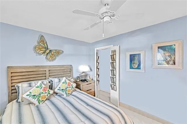 a kitchen with stainless steel appliances a refrigerator sink and cabinets