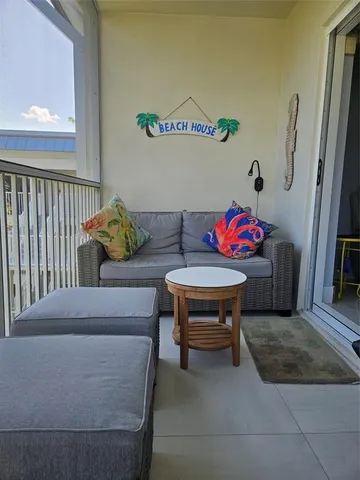 a view of a living room and furniture