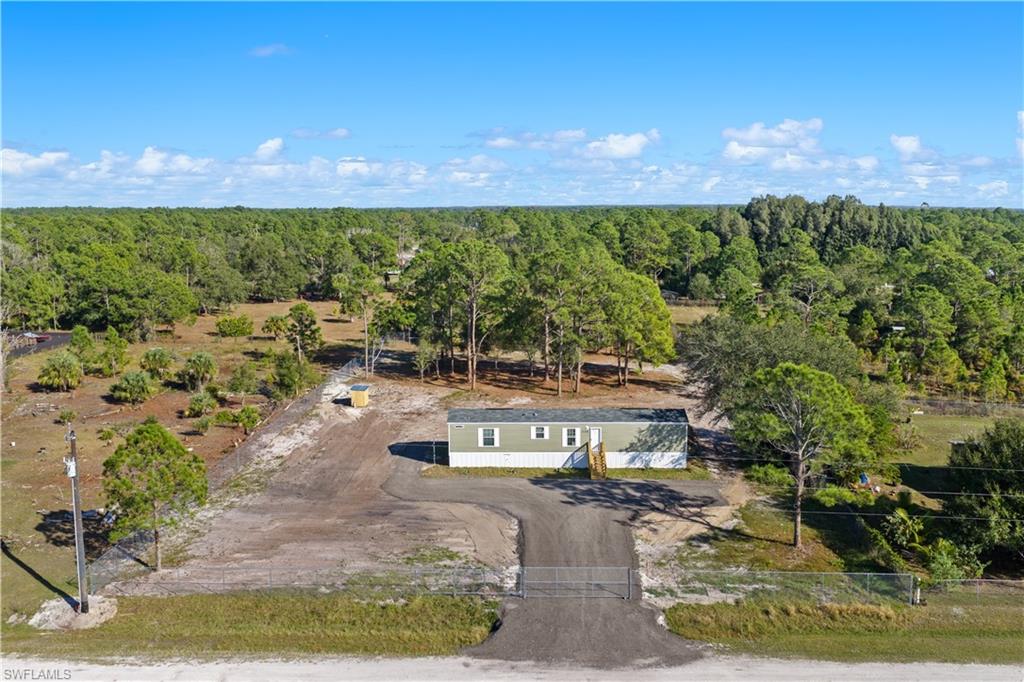 a view of a yard with an outdoor space