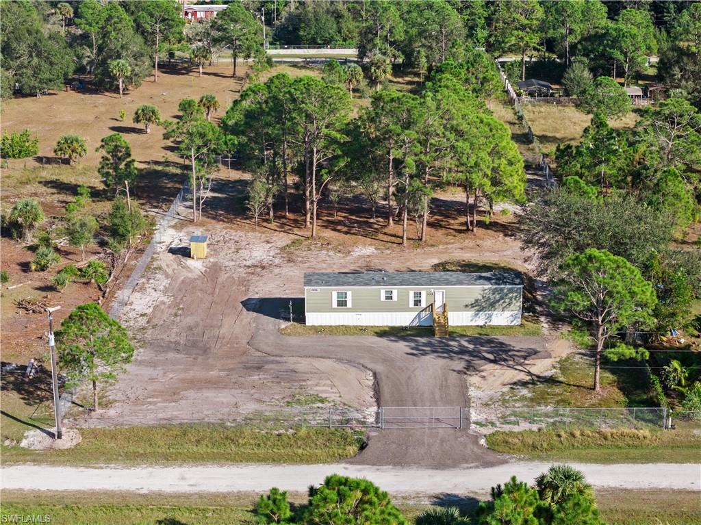 325 North Sendero Street Clewiston, FL 33440 - Photo 2 of 10 a view of street with houses