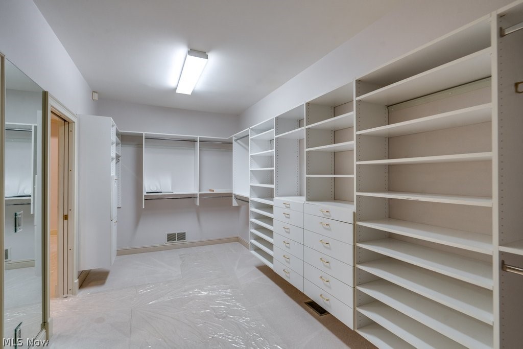 4171 Glenmoor Road Northwest Canton, OH 44718 - Photo 21 of 32 Amazing walk in closet that leads to oversized Primary Bathroom