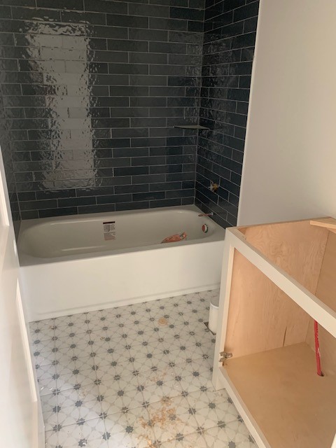 5855 Fisher Grove Road Greenbrier, TN 37073 - Photo 13 of 18 a bathroom with a bathtub and shower