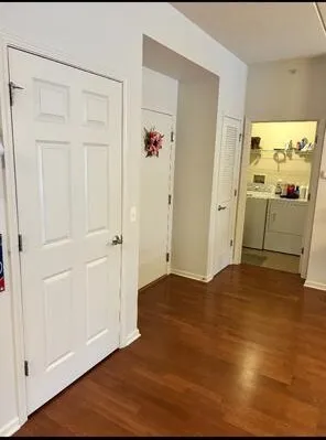 a view of a livingroom with wooden floor